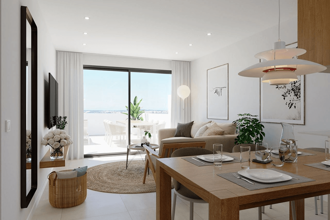 Appartements modernes de 2 chambres au rez-de-chaussée dans un complexe privé avec cave et piscine communautaire