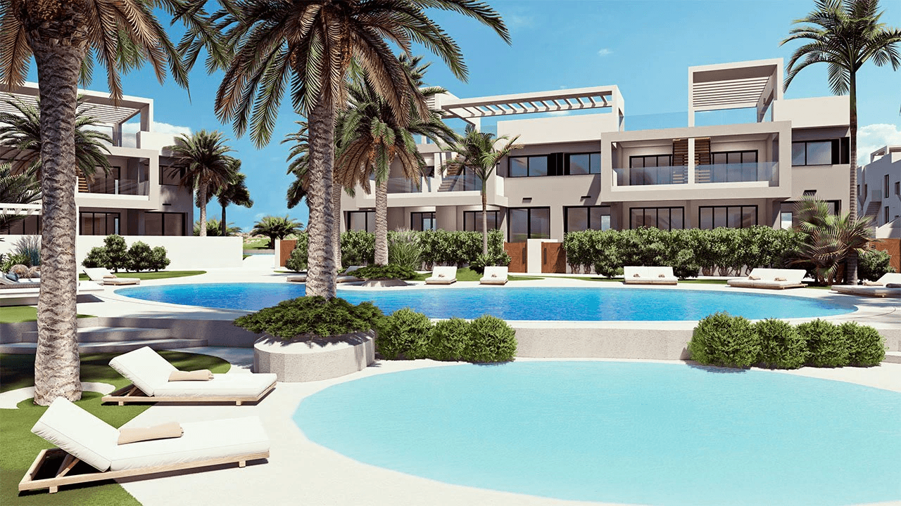 Appartements de 2 chambres et 2 salles de bain au rez-de-chaussée avec 2 terrasses, stationnement en option et piscine communautaire