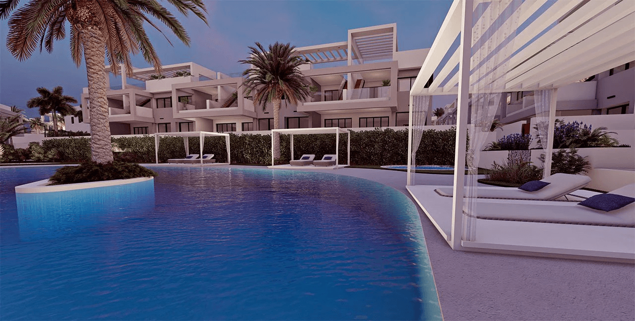Appartements de 2 chambres et 2 salles de bain au rez-de-chaussée avec 2 terrasses, stationnement en option et piscine communautaire