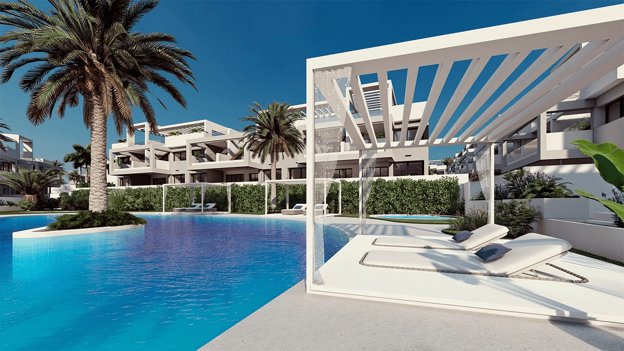 Appartements de 2 chambres et 2 salles de bain au rez-de-chaussée avec 2 terrasses, stationnement en option et piscine communautaire