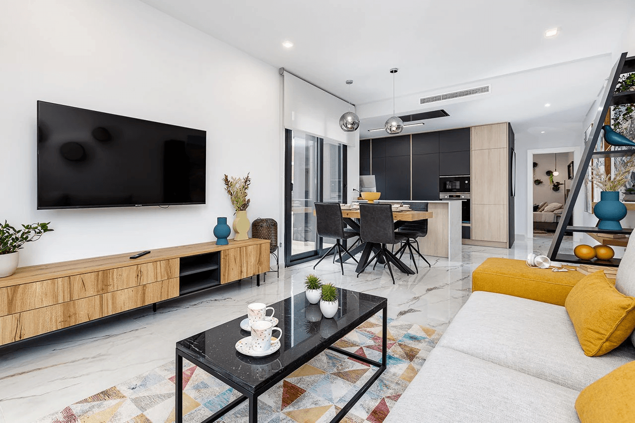 Appartements en rez-de-chaussée avec 2 chambres, cuisines équipées d’électroménagers, climatisation, parking privé et piscine commune